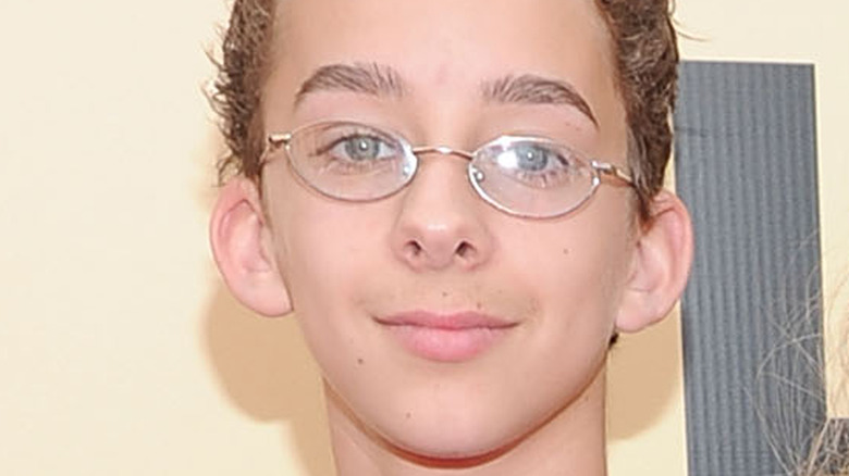 Sawyer Sweeten wearing glasses at a premiere 