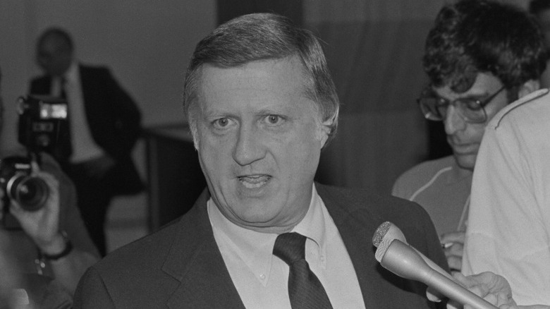 George Steinbrenner speaking into microphone