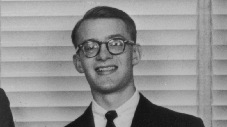 Michael Rockefeller in glasses smiling