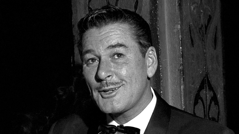 Errol Flynn at a dinner