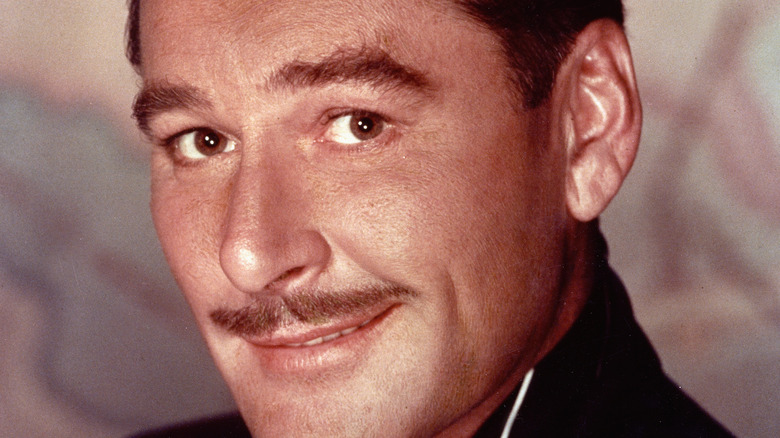 Errol Flynn smirking