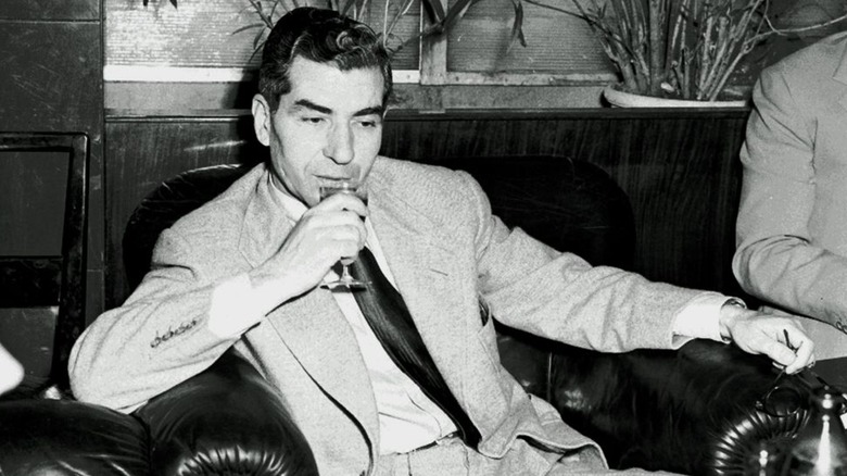 Charles Lucky Luciano sat sipping drink