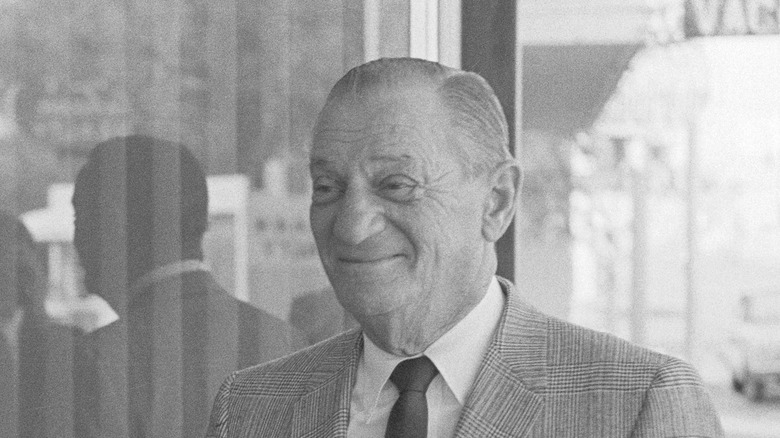Dalitz smiling in suit