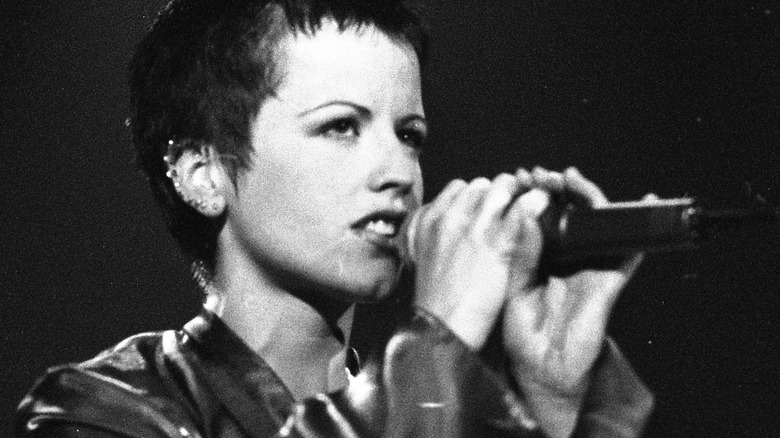 Dolores O'Riordan performing in 1990s