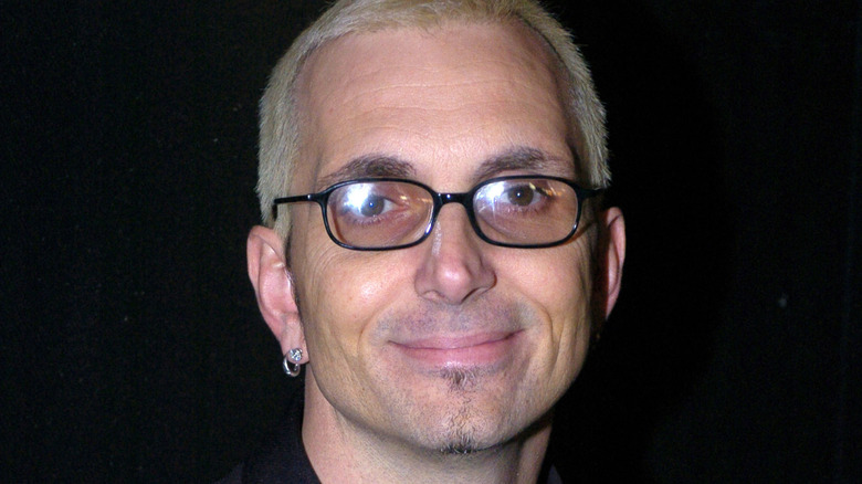 art alexakis smirking in glasses
