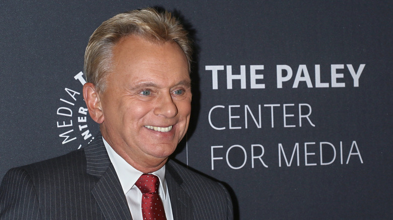 Pat Sajak smiling at an event