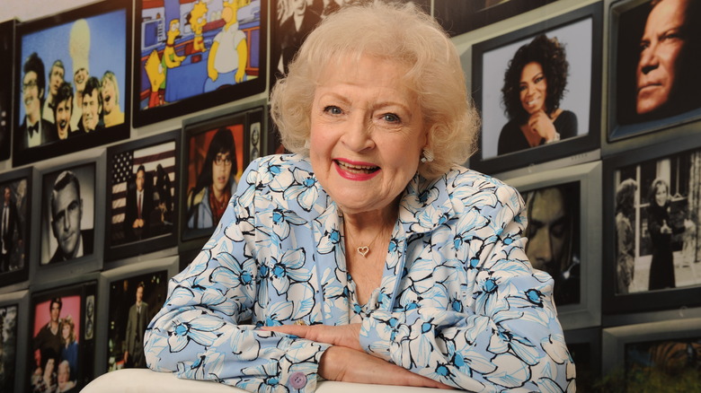 Betty White smiling flower shirt