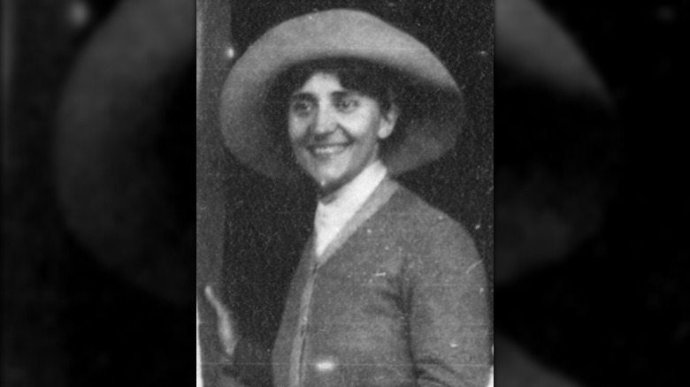 Hélène Leune smiling in a hat