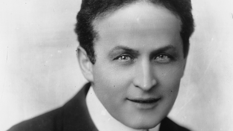 Harry Houdini poses
