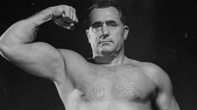 Charles Atlas flexing