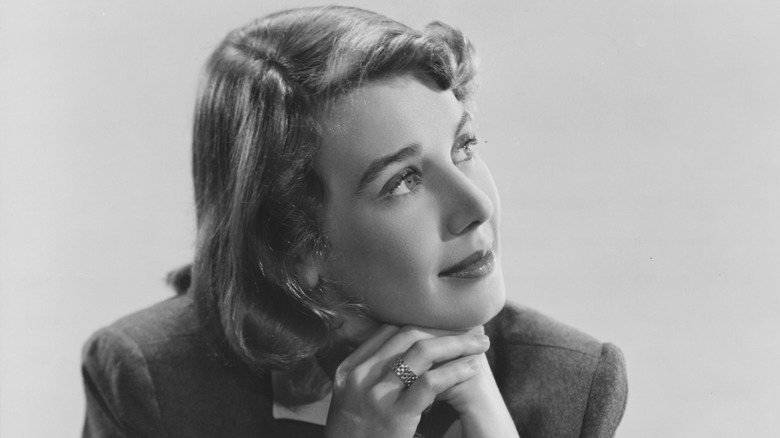 Betsy Drake rests head on folded hands