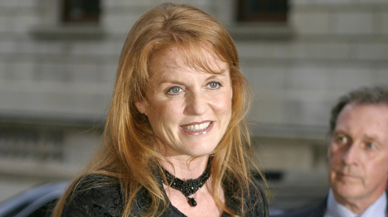 Sarah Ferguson staring out with gritted teeth