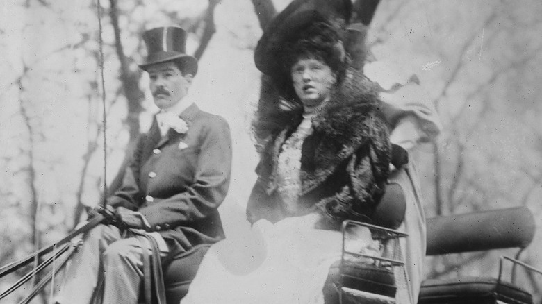 Alfred riding in carriage