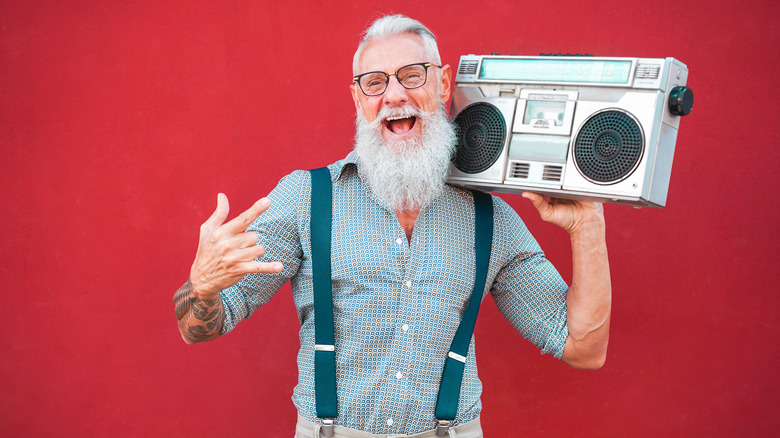 man with '80s boombox