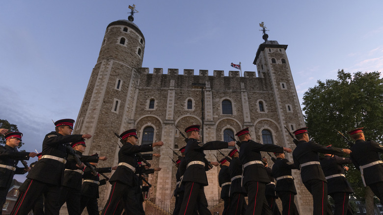Troops marching past the Tower 
