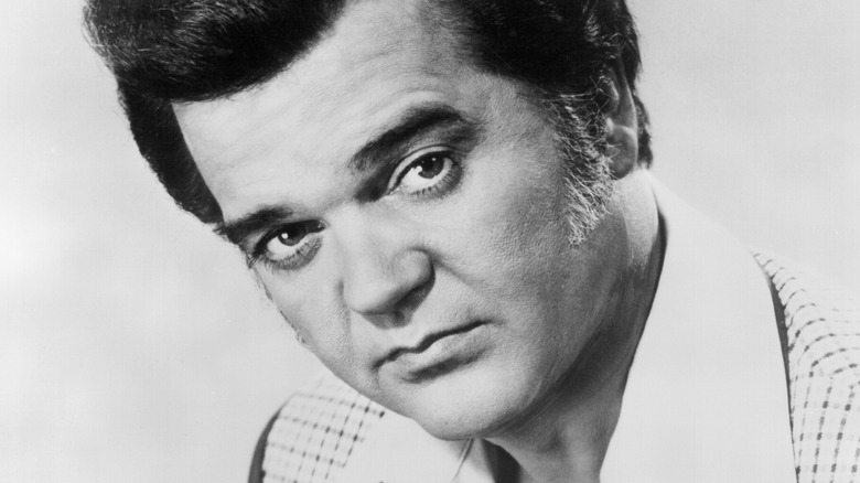 Conway Twitty posing in a 1970s promotional photo