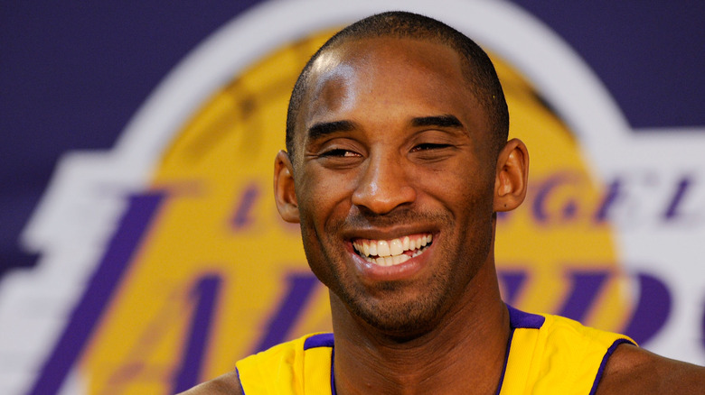 Kobe Bryant smiling in uniform