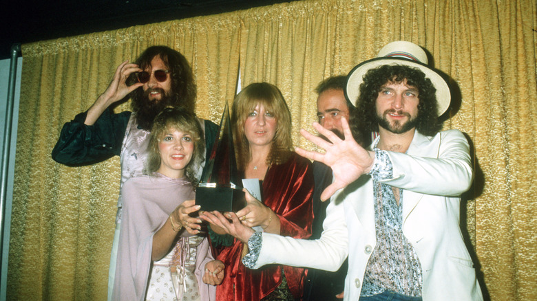 Fleetwood Mac poses with an award in the '70s