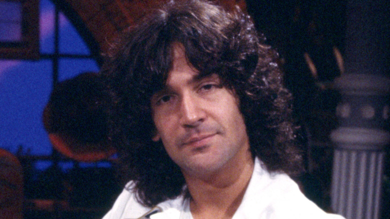 Billy Squier staring at camera
