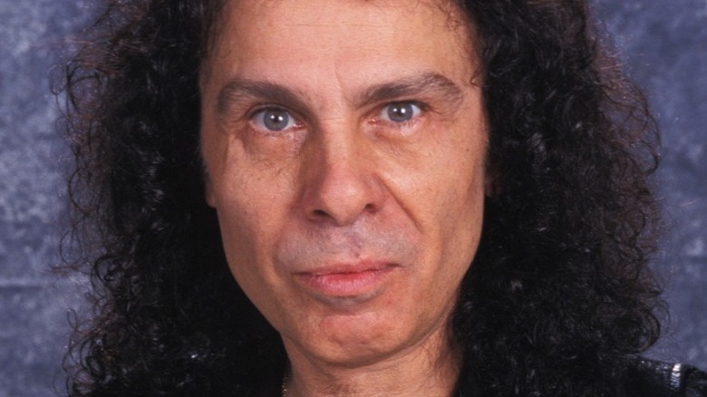 Ronnie James Dio throwing up devil horns