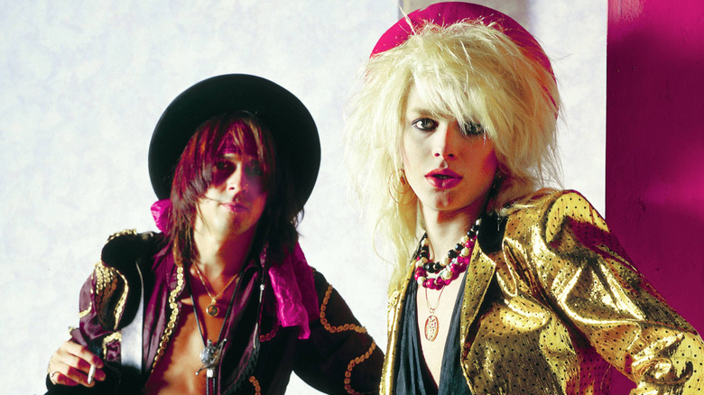 Two members of Hanoi Rocks posing for camera