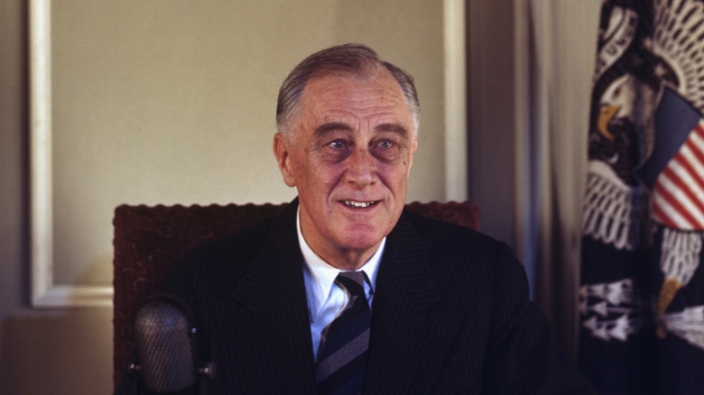 Portrait of Franklin D. Roosevelt seated at his desk