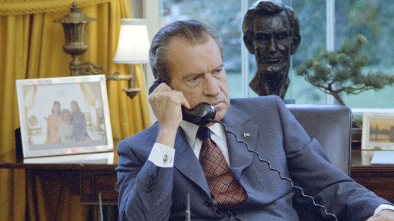 Richard nixon on the phone in the Oval Office