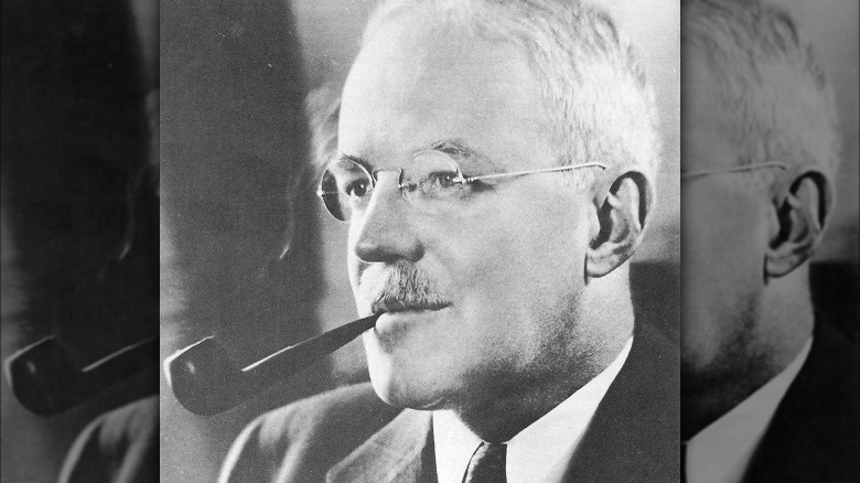 Allen Dulles smoking a pipe