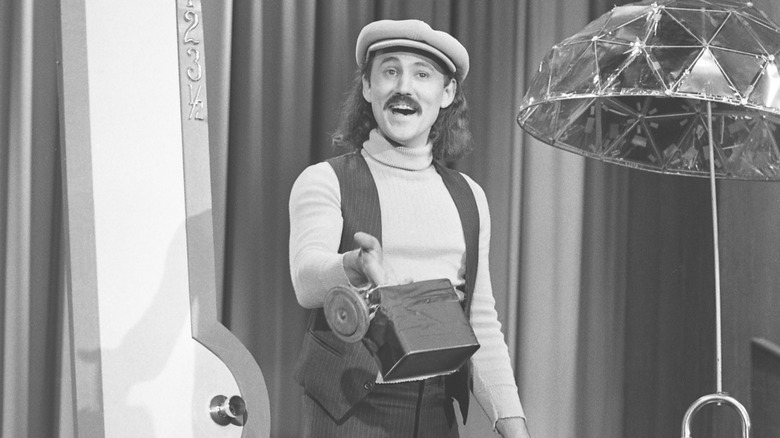 Gallagher on stage with props 
