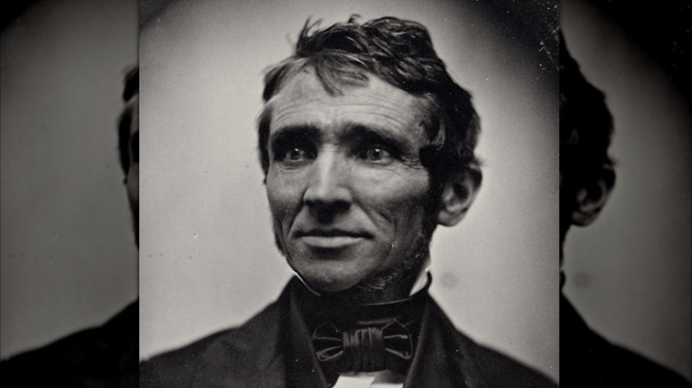Charles Goodyear in suit and bow tie looking to right in portrait photo