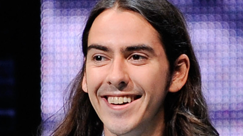 Dhani Harrison smiling