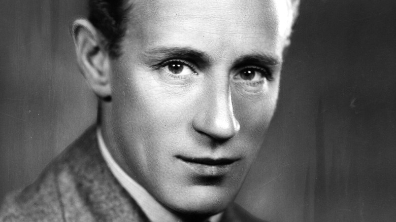 Leslie Howard staring ahead