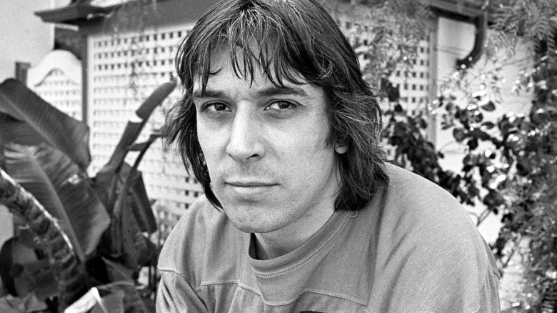 John Cale Velvet Underground sitting outside