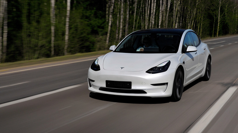 white tesla vehicle