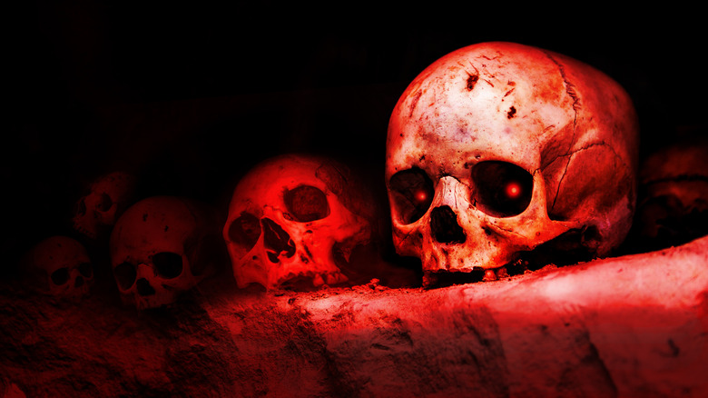 human skulls black background