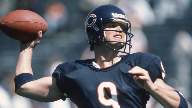 Jim McMahon in a Bears uniform throwing football