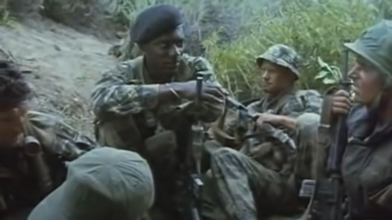 soldiers huddled