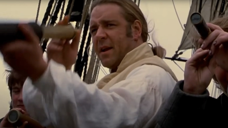 captain holding telescope