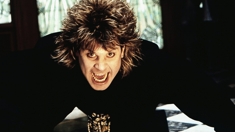 Ozzy Osbourne screaming into the camera