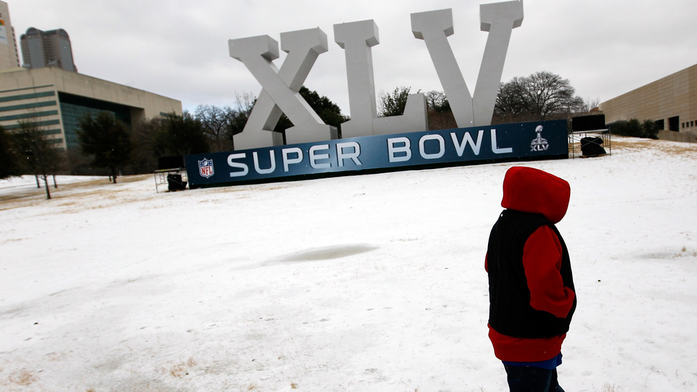 child and Super Bowl sign