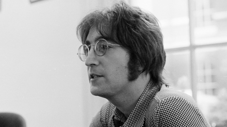 John Lennon wearing glasses