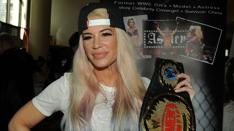 Ashley Massaro holding the title