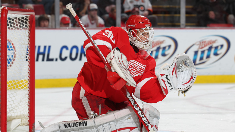 Chris Osgood making a save