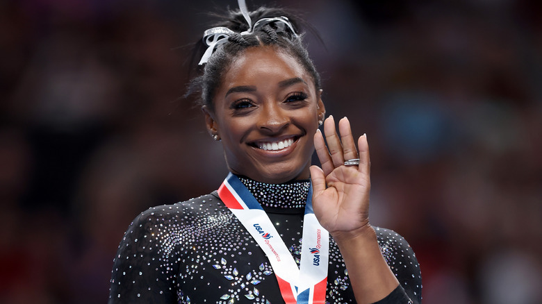 Simone Biles waving 