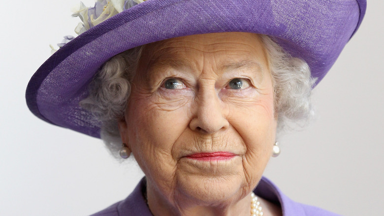 Queen Elizabeth II purple hat