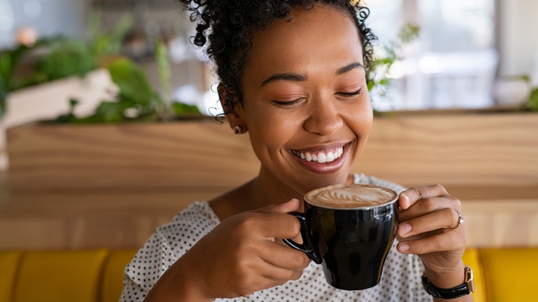 woman drinking coffee
