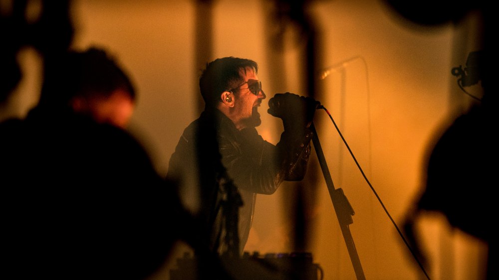 Trent Reznor putting on a Nine Inch Nails show