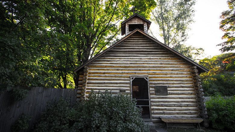 Old wooden school in forest