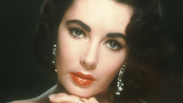 Elizabeth Taylor with chin on hand