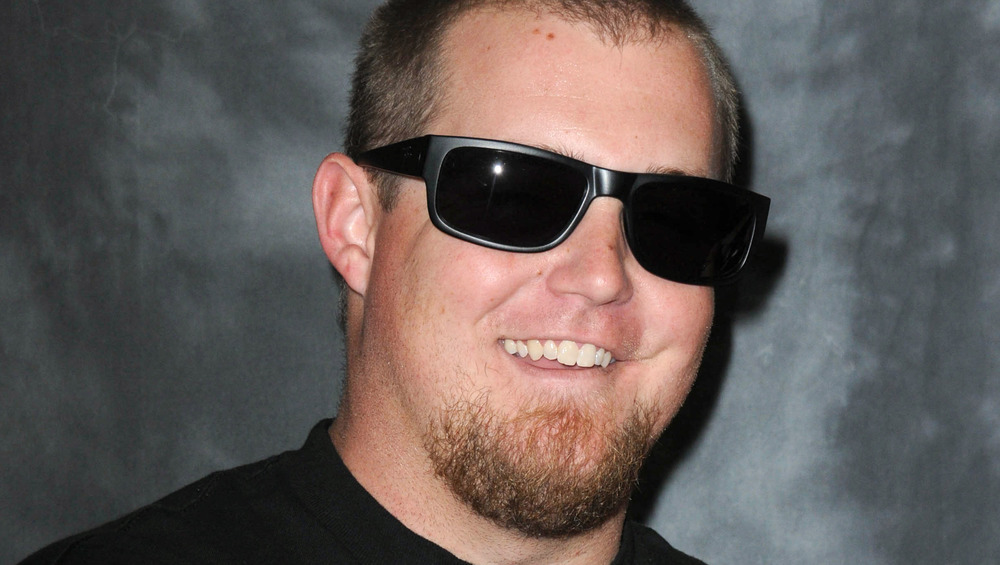 Brandon Sheets smiling in sunglasses